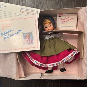 New! Switzerland Madame Alexander Doll in Olive and Crimson Dress